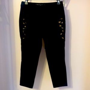 Chico’s “so slimming girlfriend ankle” jeans.